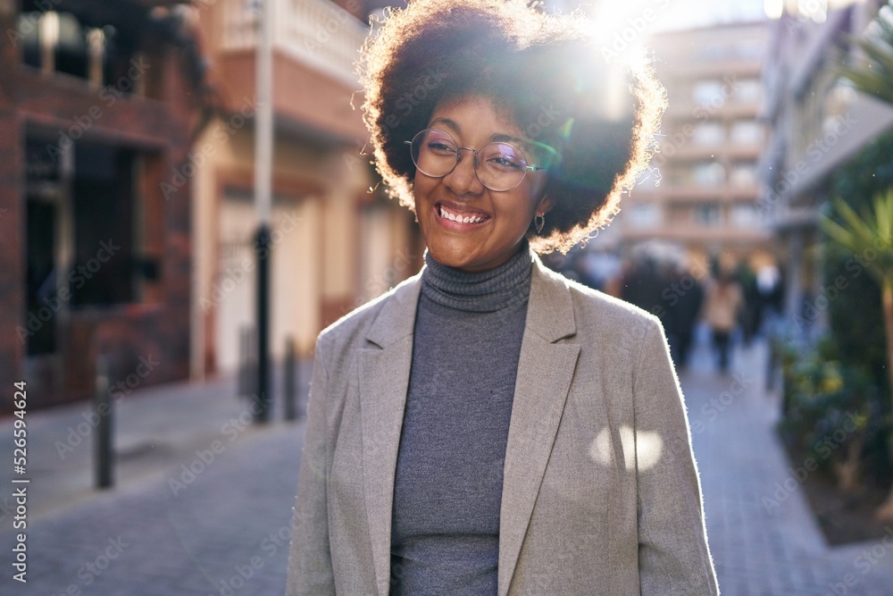 Obraz premium African american woman executive smiling confident standing at street