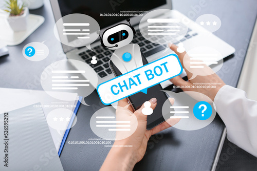 Woman with laptop and mobil...