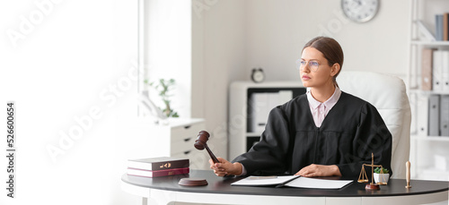 Female judge with documents...