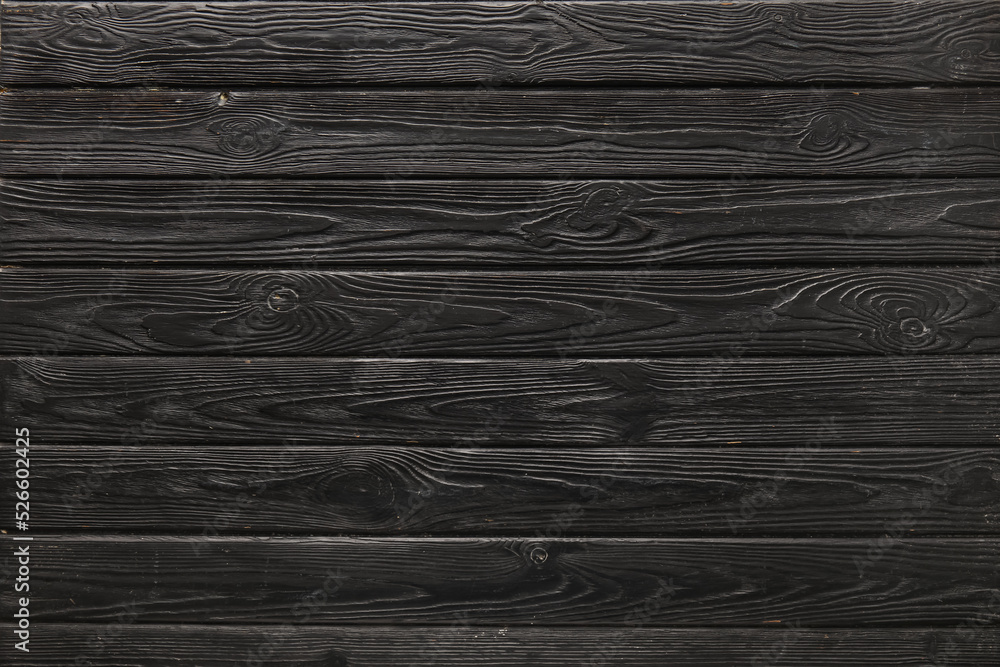 Naklejka premium Black wooden boards as background