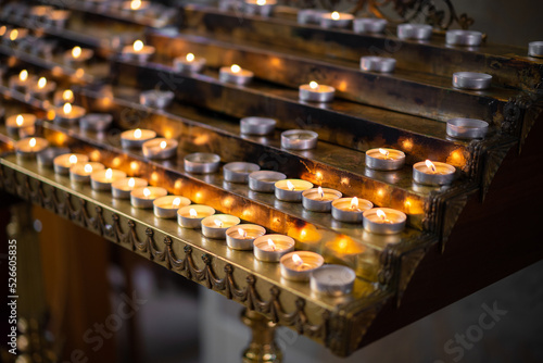 many candles in the church