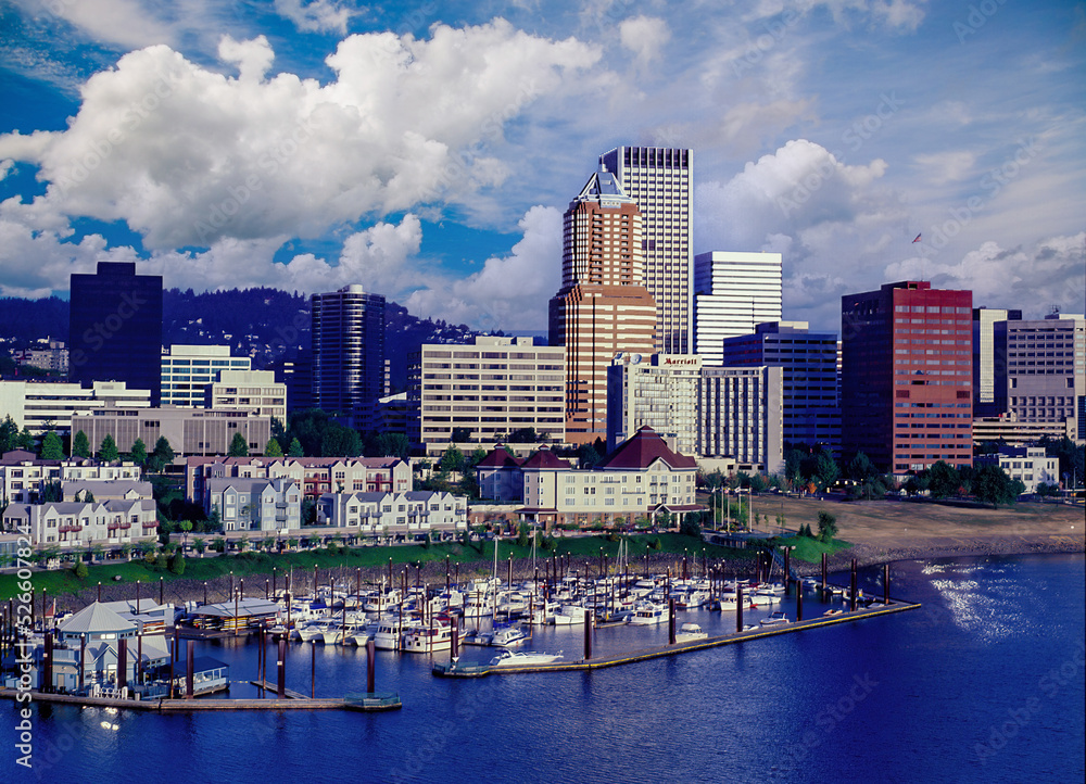view of downtown Portland, Orgon with a boat docking facility in the foreground.