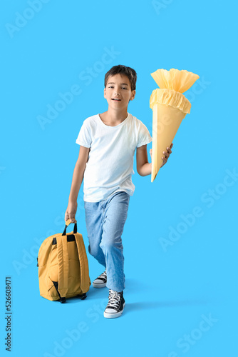 Little boy with yellow scho...
