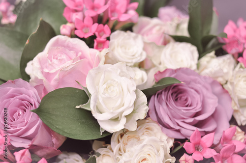 Close up of fresh pink white and violet roses bouquet  gift for women