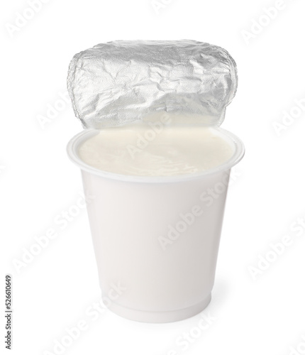 Delicious organic yogurt in plastic cup isolated on white