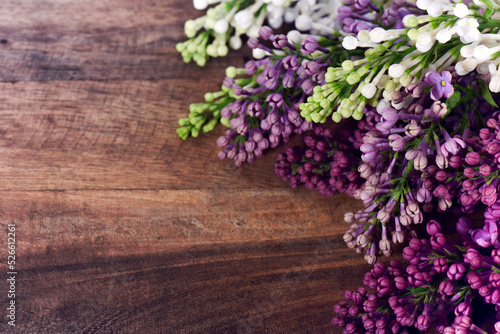 bouquet of lilacs on the background of a wooden board