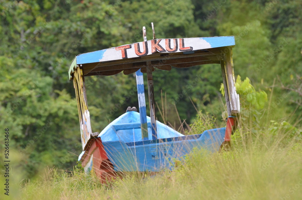 a photo of a typical Indonesian wooden ship, the ship that will be repaired a photo of a typical Indonesian wooden ship, the ship that will be repaired