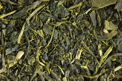 Japanese green tea leaves, high magnification macro. Sencha green tea.  photo