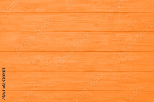 Texture of orange wooden surface as background, top view