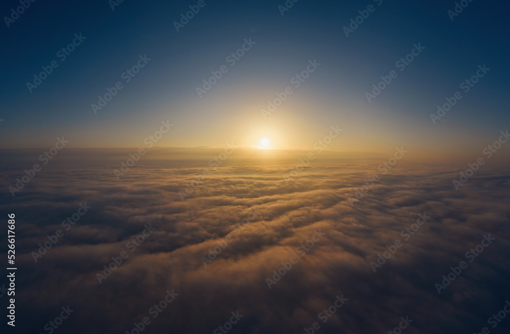 Clouds and stars in the blue night sky.