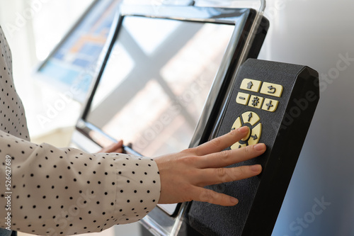 A woman uses a voting device for blind and visually impaired citizens. 