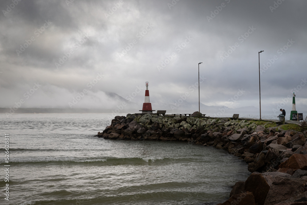 lighthouse on the shore of the sea in brazil