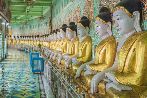 golden buddha cave at Umin Thonze Pagoda Sagaing Mandalay Mayanmar photo