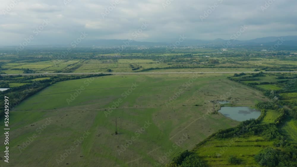 Aerial View Of Fields And Highway Near Old City Of Kutaisi In Georgia. Aerial View Of Fields And Highway Near Old City Of Kutaisi In Georgia.
