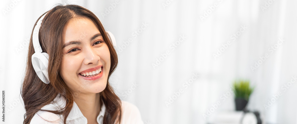 Portrait of big smiling happy beautiful pretty asian woman clean fresh healthy white skin posing smile in pajamas white clothes.Girl felling relax and enjoy time on the bed at home.asia beauty Portrait of big smiling happy beautiful pretty asian woman clean fresh healthy white skin posing smile in pajamas white clothes.Girl felling relax and enjoy time on the bed at home.asia beauty
