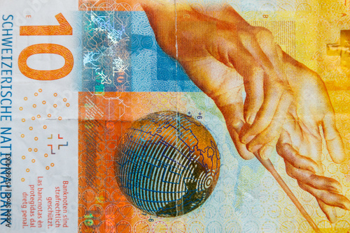 Macro shot of the ten swiss francs banknote photo