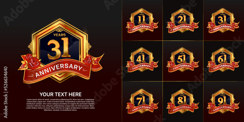 set of anniversary gold color with red ribbon for special moment celebration