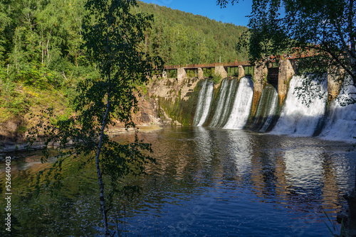 Dam. Waterfall. Natural historical complex 