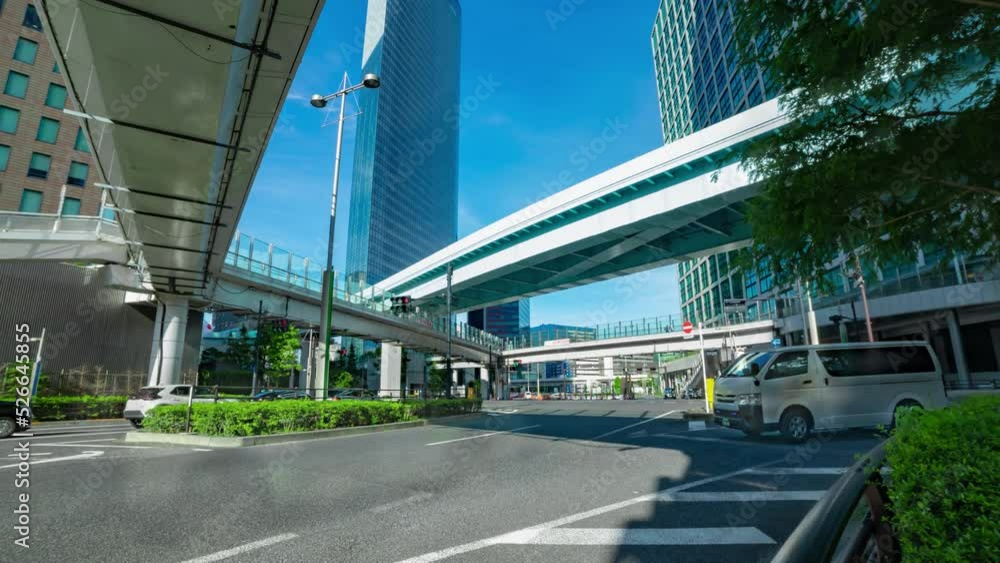 A timelapse of traffic jam at the business town in Tokyo wide shot zoom A timelapse of traffic jam at the business town in Tokyo wide shot zoom