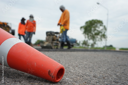 Blurred image of pavement repair work.
