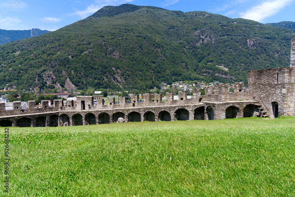Obraz premium Scenic view of Unesco world heritage castle Castelgrande at City of Bellinzona, Canton Ticino, on a blue cloudy summer day. Photo taken July 4th, 2022, Bellinzona, Switzerland.