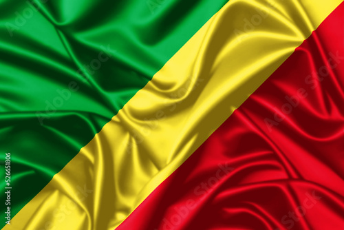 Republic of the Congo waving national flag close up silk texture satin illustration background.