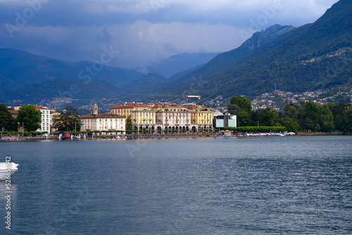 Scenic view of bay of Lake Lugano, Canton Ticino, on a cloudy summer day. Photo taken July 4th, 2022, Lugano, Switzerland.
