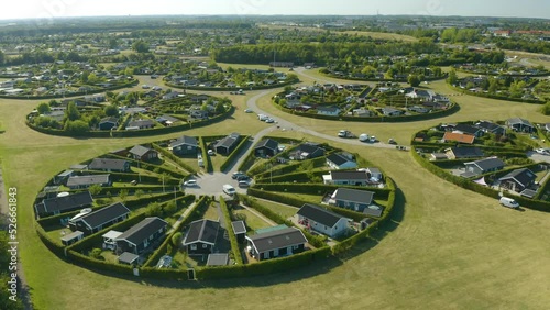 Wide Aerial View of Circular Communities Focused on Eco-Friendly Lifestyles. Orbiting photo