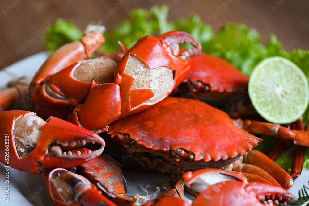 claw crab, fresh crab on wooden cutting board seafood crab cooking food boiled or steamed crab red in the seafood restaurant kitchen claw crab, fresh crab on wooden cutting board seafood crab cooking food boiled or steamed crab red in the seafood restaurant kitchen
