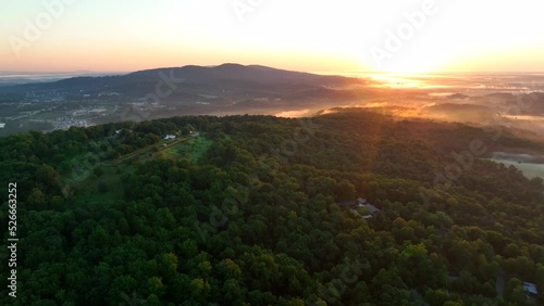 Shenandoah Mountains in USA at sunrise. Beautiful aerial with colorful horizon glow. photo