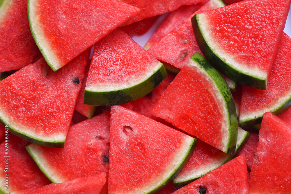 Watermelon slice on background, Closeup pile of sweet watermelon slices pieces fresh watermelon tropical summer fruit Watermelon slice on background, Closeup pile of sweet watermelon slices pieces fresh watermelon tropical summer fruit