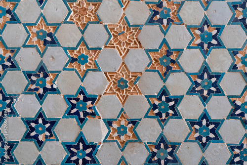 Closeup view of mosque wall decor with ancient blue white and turquoise tiles in flower and star pattern  Kok Gumbaz  Istaravshan  Sughd region  Tajikistan