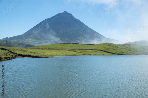 Portugal, Azores, Lagoa do Capitao with Mount Pico in background photo