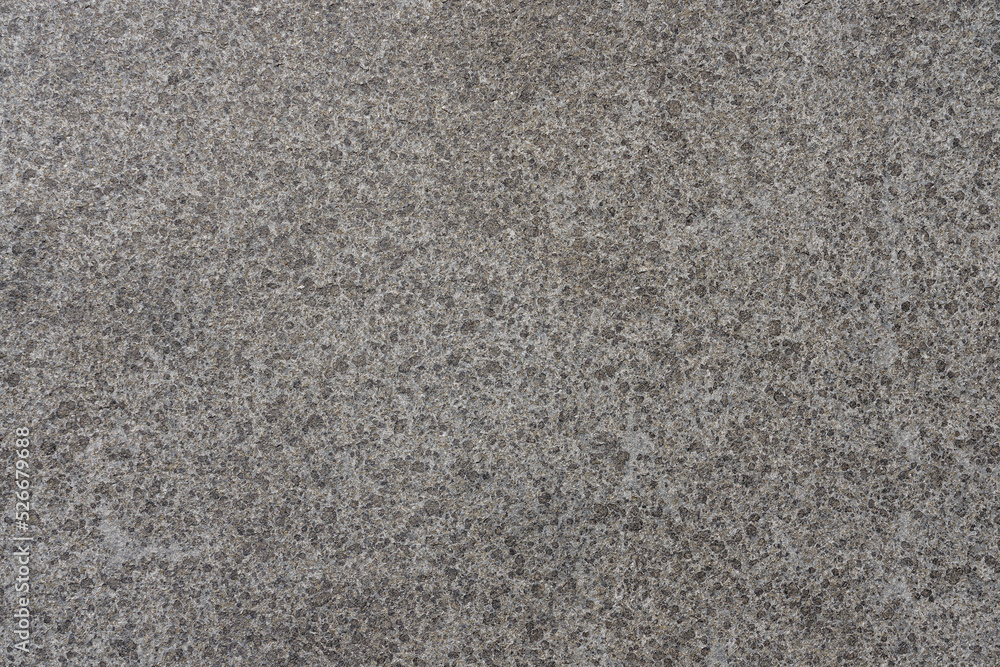 Polished stone, interestingly textured image background consisting of gray polished stone. Copy space for your design. Web banner. Polished stone, interestingly textured image background consisting of gray polished stone. Copy space for your design. Web banner.