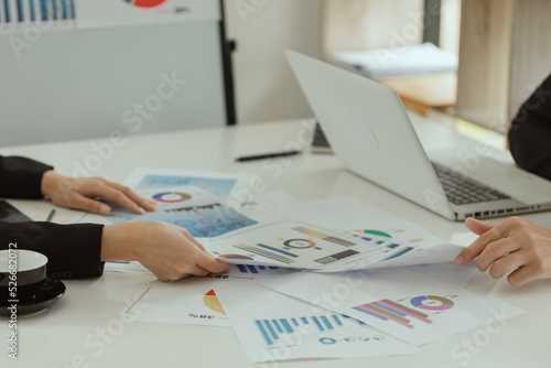 Business people hands working on finance marketing chart, financial document data graph, 