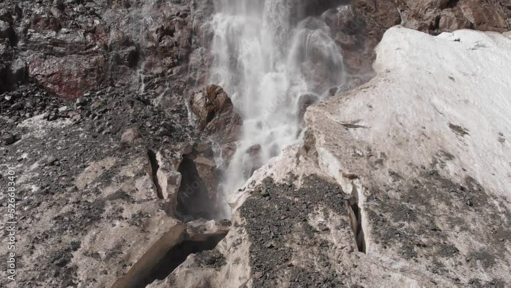 Caucasus, Ossetia. Tana Gorge. Waterfall on the rocks. Caucasus, Ossetia. Tana Gorge. Waterfall on the rocks.