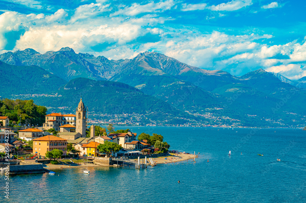 Panorama on the upper lake of Como, with the town of Musso, its houses and the bell tower
