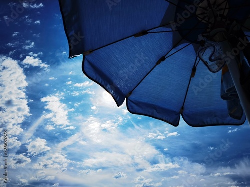 umbrellas on the beach in late summer on the western Ligurian Riviera