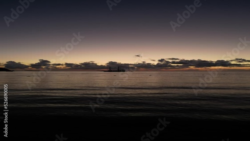 Vertical 4K video of Beautiful sunrise with a huge wooden ship. High-quality 4k footage