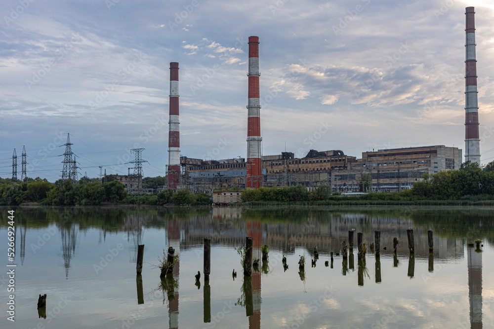 old factory stands near the lake old factory stands near the lake