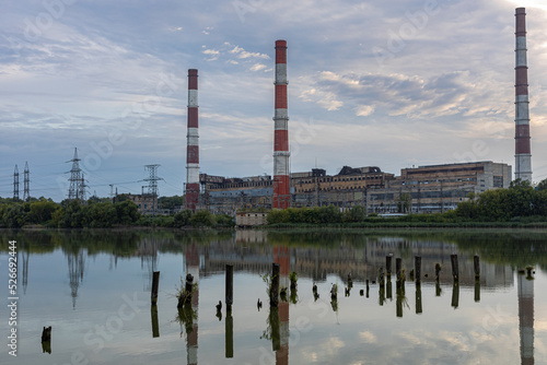 old factory stands near the lake