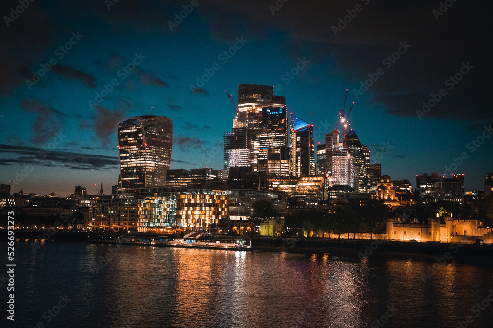 Skyline of London at night with the lights