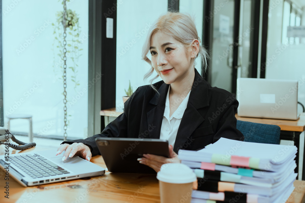 Friendly cheerful asian businesswoman smiling, people emotions and casual concept, positive woman working in office workspace. Friendly cheerful asian businesswoman smiling, people emotions and casual concept, positive woman working in office workspace.