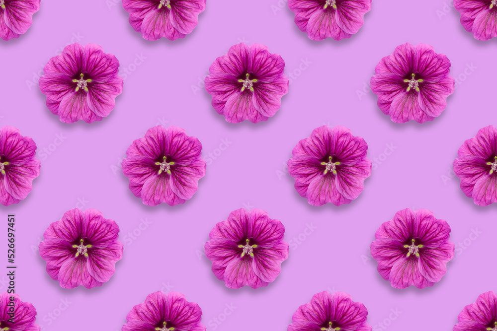 Pattern of purple flowers on a purple background Pattern of purple flowers on a purple background