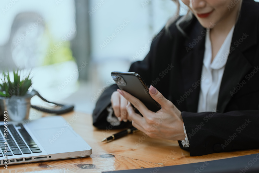 Businesswoman working with calculator and laptop computer at office workplace, finance marketing chart, Business digital technology and marketing concept. Businesswoman working with calculator and laptop computer at office workplace, finance marketing chart, Business digital technology and marketing concept.