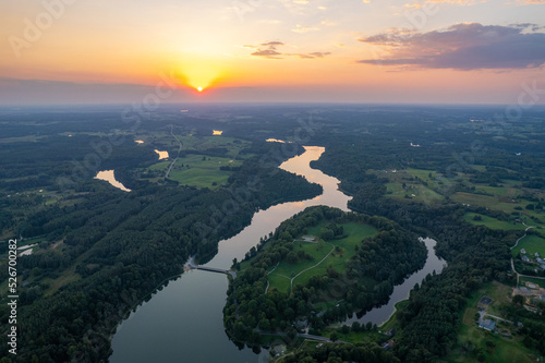 Aerial summer beautiful sunset view of Asveja lake, Dubingiai, Lithuania photo