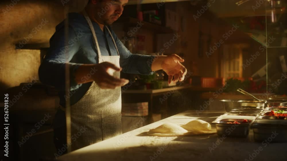 In Restaurant Professional Chef Preparing Pizza, Tenderly Working, Kneading Dough, Traditional Family Recipe. Authentic Pizzeria with Deliciously Organic Food. Slow Motion Cinematic Sunny Shot In Restaurant Professional Chef Preparing Pizza, Tenderly Working, Kneading Dough, Traditional Family Recipe. Authentic Pizzeria with Deliciously Organic Food. Slow Motion Cinematic Sunny Shot