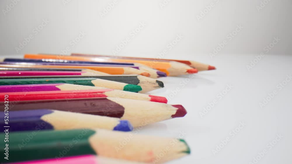 Extreme Close-up, Colored Pencils Lying on White Background Extreme Close-up, Colored Pencils Lying on White Background