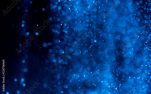 Abstract Blue bokeh defocus glitter blur background.