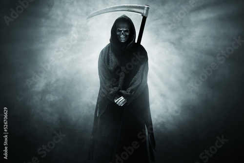 Grim reaper on dark background